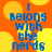 Blue pixelated text reads "I belong with the nerds" on an orange background with yellow circular shapes, repeated in a pattern