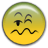 Static pixelated yellow emoji with green gradient top, black facial features including squinted eyes and wavy mouth, no visible text or additional objects.