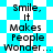 A pixelated image with repeating text "Smile, It Makes People Wonder..." on a blue and white checkered background.