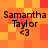 Pixelated orange and red checkered background with four identical text blocks reading "Samartha Taylor <3" in black font.