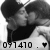 Black-and-white pixelated image of two figures in close embrace, one figure with dark hair and the other with lighter hair, both wearing dark clothing, with a numeric sequence and heart symbol at the bottom.