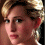 Pixelated portrait of a person with blonde hair styled in an updo, showing three distinct facial expressions