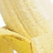 A banana-shaped object with a yellow peel and white interior, featuring pink text overlays in two states: 'MOnkey' and 'POwer<3!'.