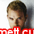 A pixelated image of a person with short brown hair against a light background, overlaid with red text reading "mett cuncks M" and "Bloody" in different sections.