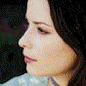 nine distinct facial portraits showing a woman with dark hair in various poses, expressions, and backgrounds