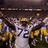 A purple background with yellow pixelated text and a small football player image, featuring 'can Ohio St. do it?' above and 'haha no they cant' below.