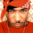 A 48x48 pixel animated contact sheet showing two frames of a person wearing an orange hoodie and red bandana with white patterns, displayed side-by-side on a gray background.