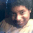 Pixelated static image of a person with light skin tone, dark hair, and visible facial features against a dark background.