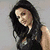 A four- shows a woman with long dark hair in different poses and backgrounds, including one with text