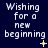 Dark blue background with white pixelated text reading "Wishing for a new beginning" and yellow star-like symbols in various positions.