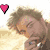 Pixelated image of a person with light brown hair and a pink heart icon, next to a Union Jack flag and purple text reading "Robert Thomas Pattinson".