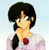Pixelated cartoon-style image of a person with black hair in a side braid, wearing a light pink top with a red circular emblem on the chest, against a light blue background.