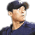 A baseball pitcher in a dark blue uniform and cap with an 'NY' logo, captured across four showing the pitching motion from windup to release