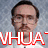 A static image of a person with glasses and a mustache in a white shirt against a gray background, with red text overlays.