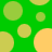 Green background with scattered light green and yellow circles, some of which are partially obscured by yellow or green segments.