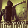 A pixelated image shows a hooded figure seated beside a framed painting of a street scene, with text reading "we want the truth" at the bottom.