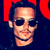 A 2x2 contact sheet of a pixelated animated icon featuring two identical frames with a person wearing sunglasses against red and dark blue backgrounds, alongside a separate frame showing "CoolBuddy.com" text on a teal background.