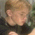 nine pixelated images showing a person in various poses and outfits with overlaid text fragments
