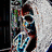 Pixelated static image of a figure with dark hair and blue clothing against a light background, partially obscured by pixelation.