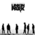 A split-screen image with a white background on the left showing pixelated black silhouettes of people and a blurred text bubble, and a red background on the right displaying "I LOVE LINKIN PARK" in bold red letters within light blue rectangles.