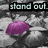 A pixelated image shows a purple rounded shape with white highlights against a gray and black background, overlaid by partially visible text reading "stand out" in light blue letters.