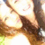 A static image of a smiling person with long brown hair, wearing a white top, with text at the bottom reading 'bestfriend<3'.