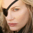 A 48x48 pixel buddy icon featuring a split composition with a close-up of a person's face on the left and "KILL BILL VOL.1" text in golden-red pixelated font on the right against black background.