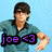 Pixelated image of a person with brown hair wearing a teal shirt, standing against light blue background with purple text 'joe <3' overlaid.