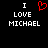Black background with white pixelated text reading "I LOVE MICHAEL" and a red heart symbol replacing the word "LOVE" in one version.