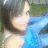 A pixelated image of a person with dark hair wearing a blue top, with the name 'Nicole' in blue text at the bottom right.