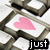 Pixelated keyboard keys with pink heart symbols and overlaid text reading 'just the right button for you!' in black block letters.