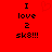 Red background with black pixelated text reading "I love 2 sk8!!!" and a faint red heart outline in the upper center.