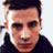 Static 48x48 pixel buddy icon showing a close-up of a person's face with dark hair and a black top against a light background, rendered in low-resolution pixel art style.