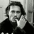 Black-and-white pixelated image of a person with dark hair resting their chin on a hand, next to text reading 'Johnny Depp 'gasp''.
