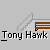 Pixelated character in yellow shirt and white head performs sequential actions against gray background with brown bench and stairs.
