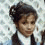 Animated sequence of a person in school uniform with dark hair styled up, transitioning from clear to blurred facial features across frames.