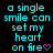 A single cyan text phrase "a single smile can set my heart on fire" appears with a pink heart symbol, then changes to a pink downward arrow, then a pink dot, and finally a cyan dot on a black background.
