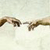 Two hands extend toward each other against a light background, fingers reaching in a gesture of connection.