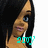 Pixelated close-up of a person with long dark hair, light skin, and blue eyes, wearing a white top with a turquoise graphic element.