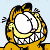 Pixelated cartoon cat with orange and black stripes forming a circular frame around a white center, set against light blue background.