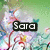 Pixelated image with green background and colorful floral elements, featuring a black rectangular text box containing the word 'Sara' in white block letters.
