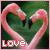 Four animated frames of pink flamingos forming a heart shape with their necks, each frame displaying the word "Love" in pixelated text at the bottom left against a green background.
