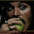 Pixelated close-up of a person holding a green object near their mouth with red text reading 'savvy?' on the right.