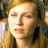 A 48x48 pixel buddy icon split into two frames showing a person with long hair on the left and green text "Original Icons .com" on a dark background on the right, displayed as an animated contact sheet.