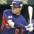 A pixelated image of a baseball player holding a bat, with red text on blue and gray backgrounds.