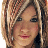 A 48x48 pixel animated buddy icon featuring a split composition with a person's face on the left and green text on a dark background on the right, displayed as part of an animated contact sheet.