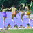 Animated sequence showing a person in purple clothing jumping over a blue barrier with multiple figures in the background, followed by a static image of three golden retrievers with "BFFs" text overlay.