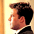 Static 50x50 pixel icon showing a side-profile of a person with dark hair and light skin against a gradient background, rendered in low-resolution pixel art style.