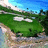 Pixelated landscape with green fields, blue sky, and scattered white clouds, rendered in low-resolution digital style.