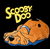 Pixelated orange cartoon character with blue accents lies on black background beneath yellow pixelated text reading 'Scooby Doo'
